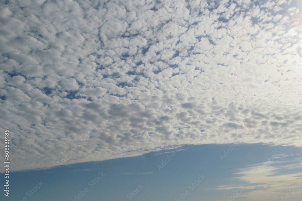 Cumulus clouds covered the blue sky, natural background