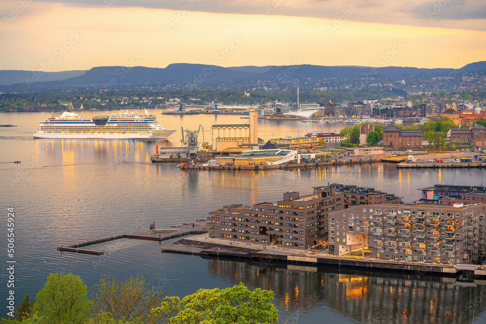  Oslo waterfront downtown city skyline cityscape in Norway at sunset