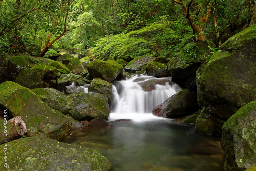 Natural Qingshan Falls trail with boulder scramble around the Shimen area at Taipei, Taiwan