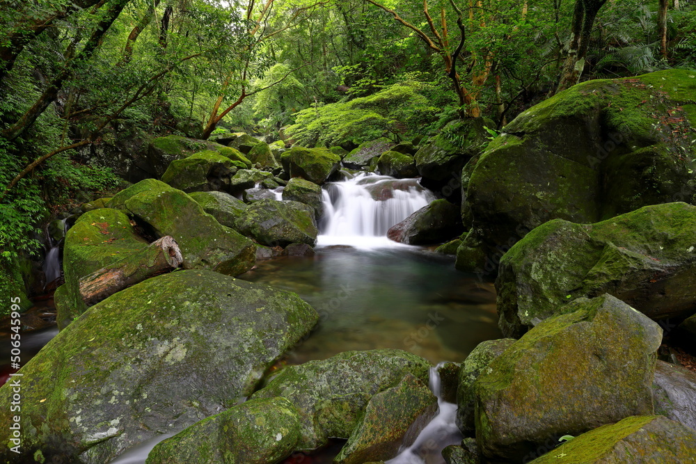 Natural Qingshan Falls trail with boulder scramble around the Shimen area at Taipei, Taiwan Natural Qingshan Falls trail with boulder scramble around the Shimen area at Taipei, Taiwan