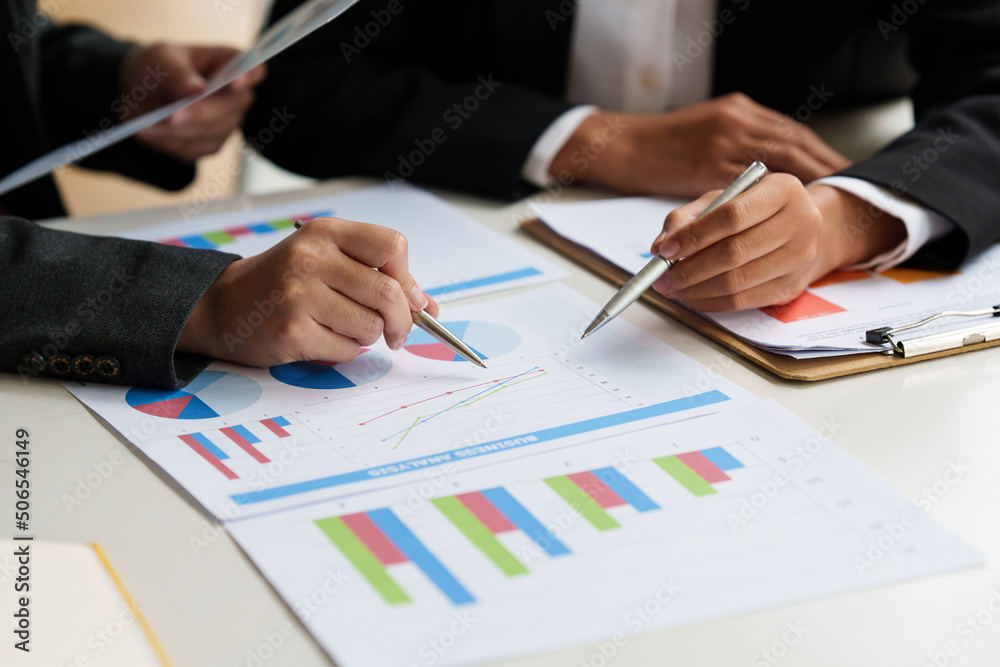 Group of Businesswoman and Accountant checking data document for investigation of corruption account. Anti Bribery concept. Group of Businesswoman and Accountant checking data document for investigation of corruption account. Anti Bribery concept.
