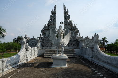 Lembuswana statue, mythological animal that has lion head with crown, elephant trunk, fish scales, and eagle wings in a temple Pulau Kumala (Kumala Island), Tenggarong, Kutai Kartanegara, Kalimantan. photo