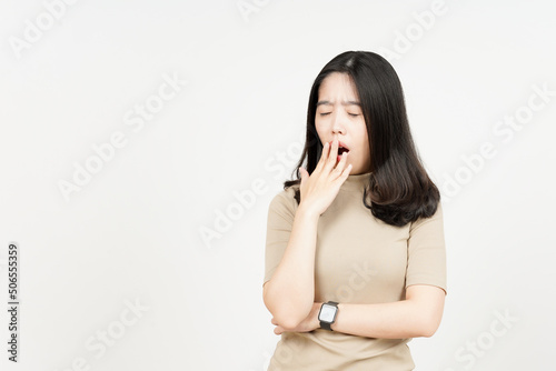 Yawning Gesture Of Beautiful Asian Woman Isolated On White Background