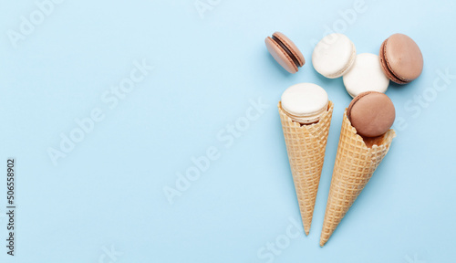 Various macaroon cookies in ice cream cones