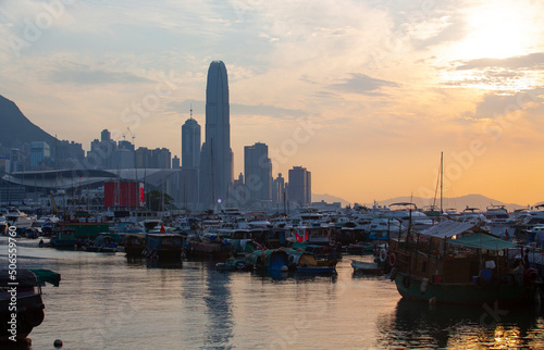 Hong Kong island, the view of typhoon shelter with old fashioned boat and new modern skyscraper © LT