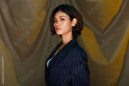 Half body 20s Asian Indian woman tanned skin wear formal suit dress curl hair beauty skin