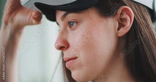 Wallpaper Mural Close up of young woman from the side putting on vr goggles Torontodigital.ca