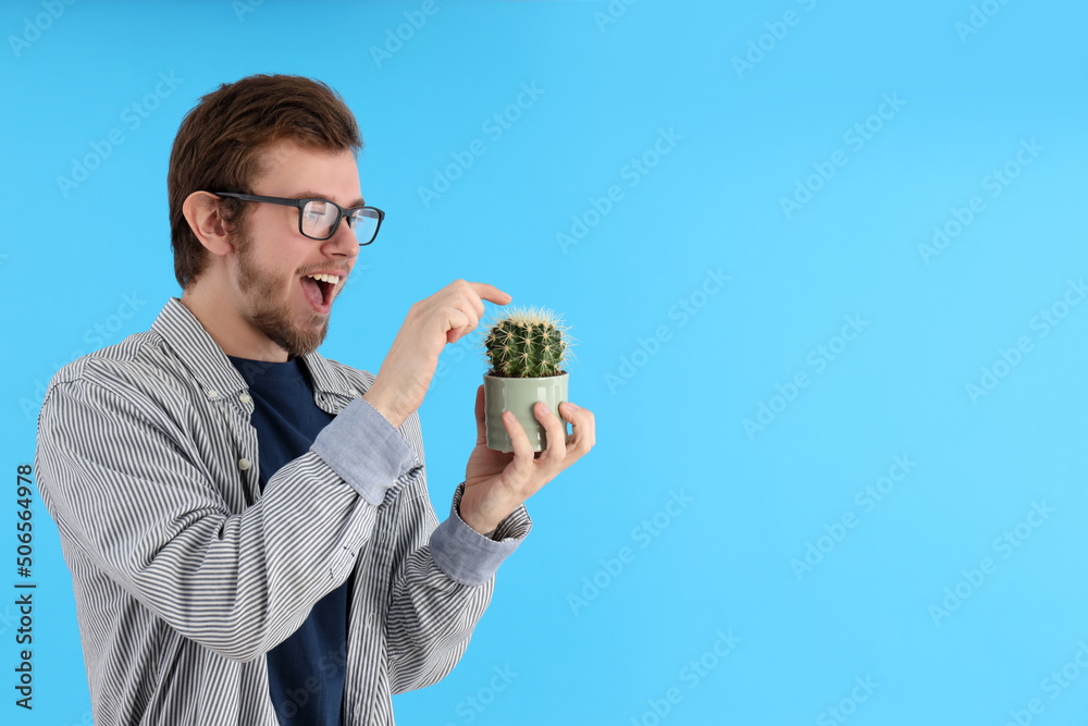 Concept of people, young man on blue background Concept of people, young man on blue background