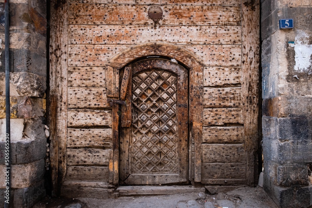 historical, wooden door and gate in old city of Damascus historical, wooden door and gate in old city of Damascus