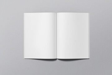 A4 magazine mockup top view, book or catalog on gray table. Blank page or notepad on solid background. Blank page or notepad for mockups or simulations.