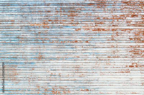 large wooden texture with peeling paint