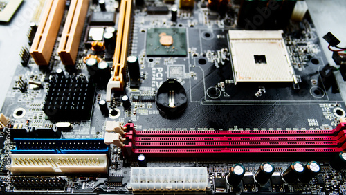 An old motherboard. Inside details of the old personal computer.