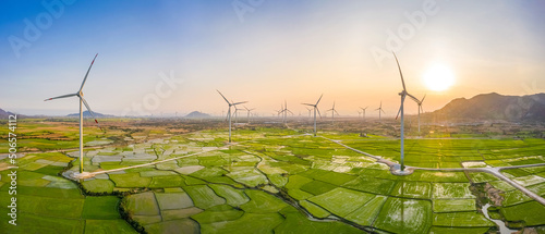 Landscape with Turbine Green Energy Electricity, Windmill for electric power production, Wind turbines generating electricity on rice field at Phan Rang, Ninh Thuan, Vietnam. Clean energy concept.