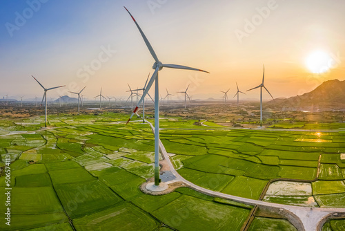 Landscape with Turbine Green Energy Electricity, Windmill for electric power production, Wind turbines generating electricity on rice field at Phan Rang, Ninh Thuan, Vietnam. Clean energy concept.
