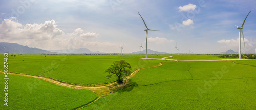 PANORAMIC VIEW OF WIND FARM OR WIND PARK, WITH HIGH WIND TURBINES FOR GENERAT...