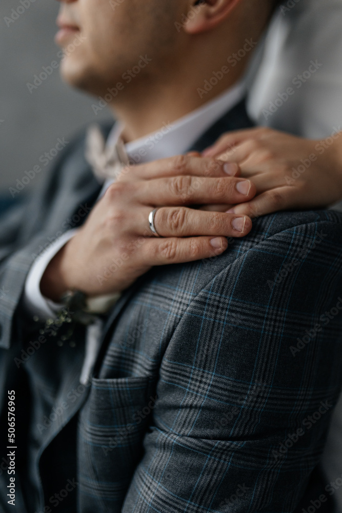 close up of a man holding his hands close up of a man holding his hands