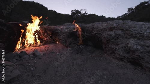 panoramic footage of eternal flame in rocks of famous Mount Chimaera in Antalya, Turkey
