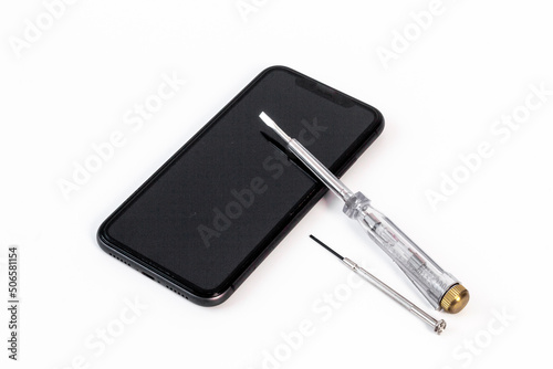 Repairing electronics - mobile phone with tools