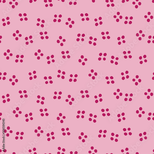 Pink seamless pattern with burgundy dots.
