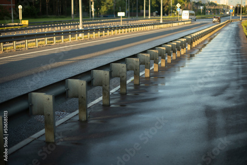 Washed road. Road bumper. Design to protect pedestrians. Fence for cars. Place of passage. Pedestrian area.