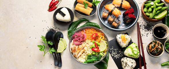 Japanese food assortment on light background.
