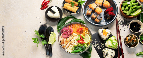 Japanese food assortment on light background.