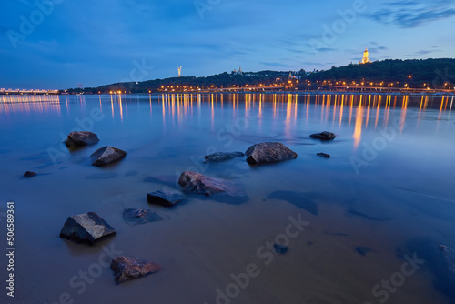 View of the Motherland Monument, Kiev Pechersk Lavra and Evening Lights at Night in Kyiv photo