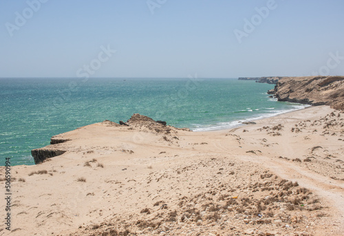 Muscat, Oman - along the highway between Muscat and Sur, Oman displays dozens of wonderful beaches, both sandy and rocky, with dunes or cliffs, and amazing green waters 