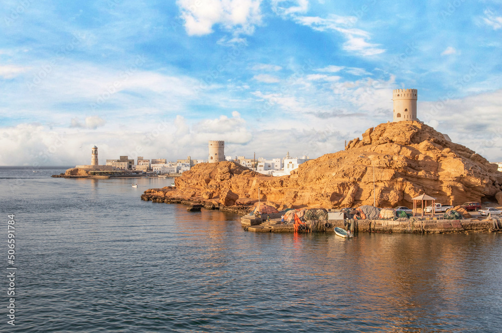 Sur, Oman - an important point for sailors and famous also for its building wooden ships, Sur is a pearl of Oman, with its fusion of green waters, white buildings and red rocks