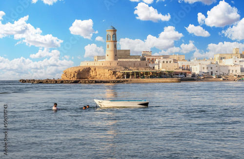 Sur, Oman - an important point for sailors and famous also for its building wooden ships, Sur is a pearl of Oman, with its fusion of green waters, white buildings and red rocks