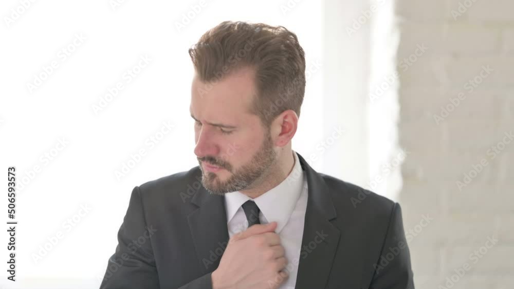 Young Businessman Coughing and Feeling Unwell Young Businessman Coughing and Feeling Unwell