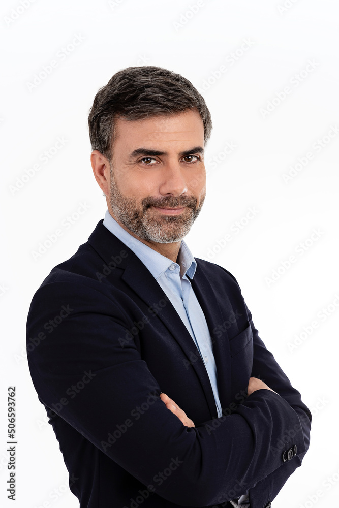 Businessman smiling with arms crossed on white background Businessman smiling with arms crossed on white background