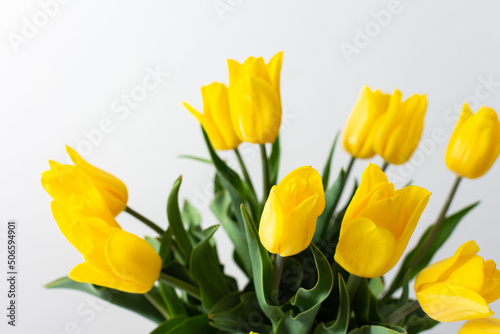 Beautiful spring bouquet of yellow tulips, top view of the bouquet