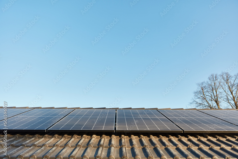 Solar system with solar cells on roof of house for solar energy Solar system with solar cells on roof of house for solar energy