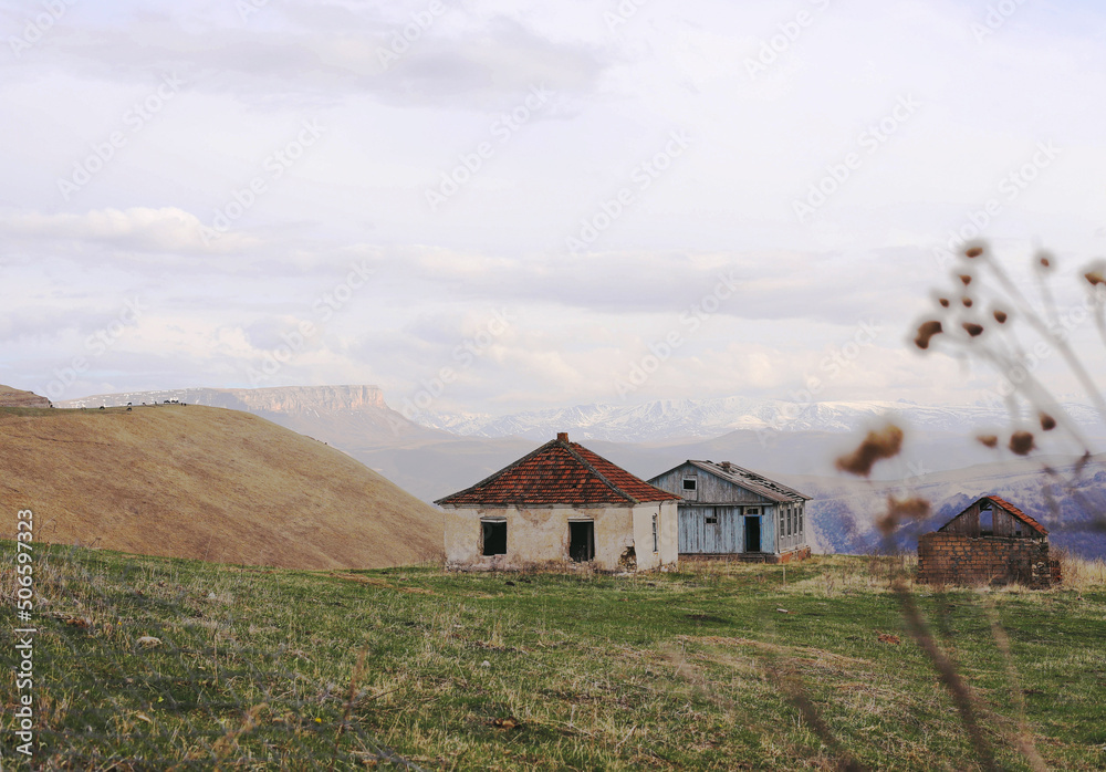 Rural landscape, abandoned houses, mountains Rural landscape, abandoned houses, mountains