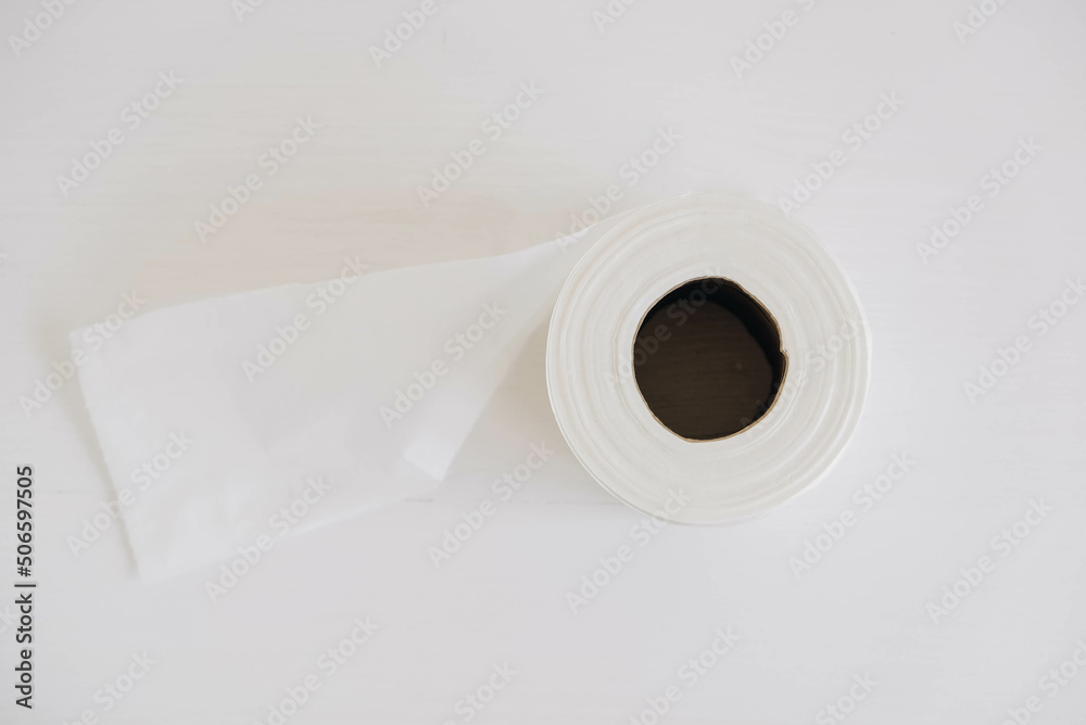 Roll of white toilet paper on a white background Roll of white toilet paper on a white background