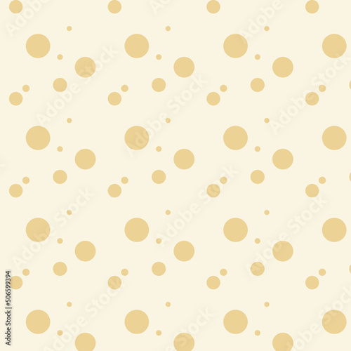 seamless pattern of dots on a beige background . vector illustration