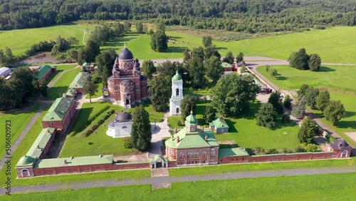 Orbital drone shot of Spaso-Borodinsky Monastery on sunny summer day. Semenovskoye village, Moscow Oblast, Russia. photo