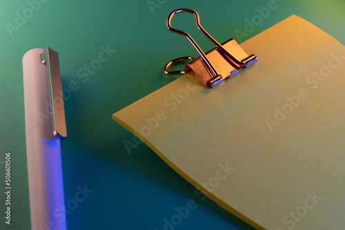 Sticky note and pen