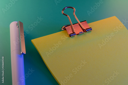 Sticky note and pen