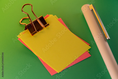 Blank colorful sticky notes and pen