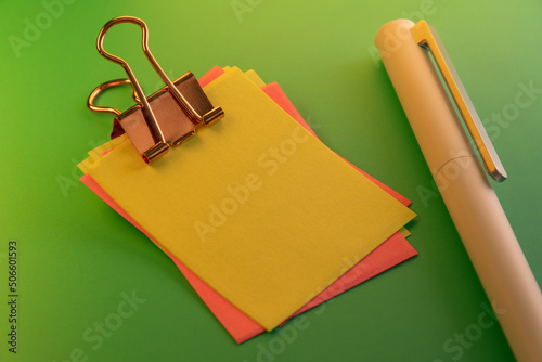 Blank colorful sticky notes and pen