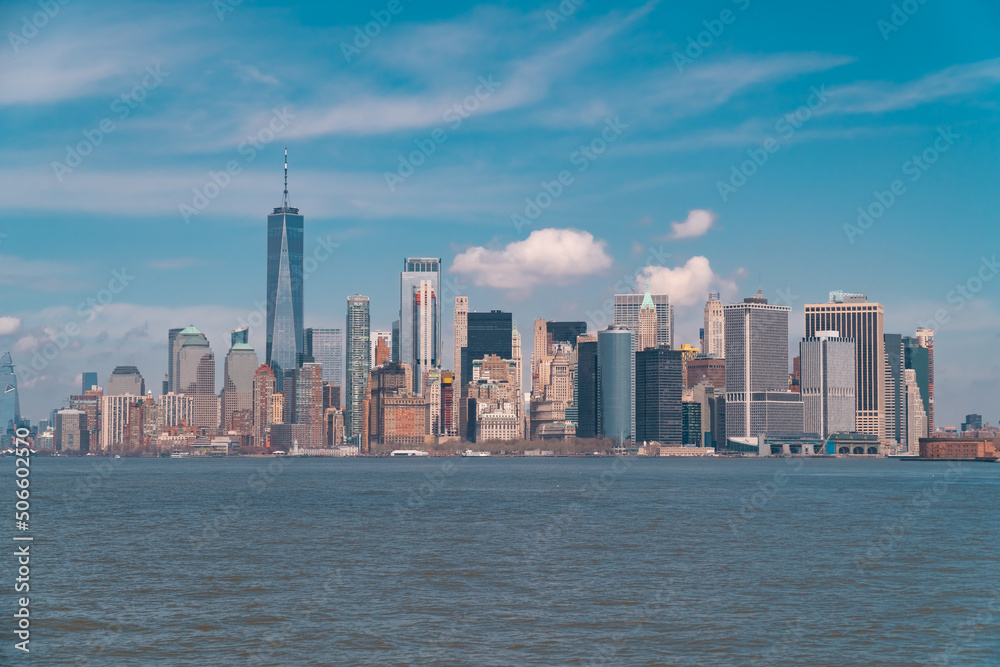 New York City skyline. Skyscrapers of Manhattan with blue sky