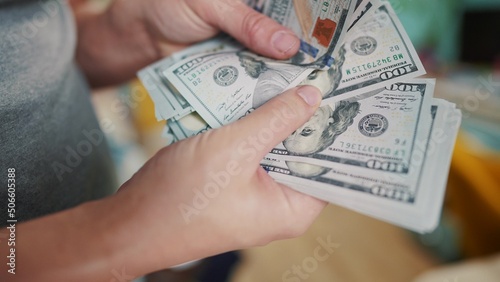 dollar lifestyle money. bankrupt man counting money cash. business crisis finance dollar concept. close-up of a hand counting paper dollars. exchange finance economy dollar usd