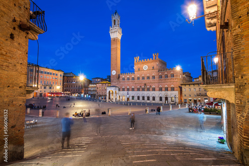 views of mangia tower in siena, italy photo