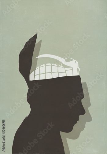 Grenade inside silhouetted head

