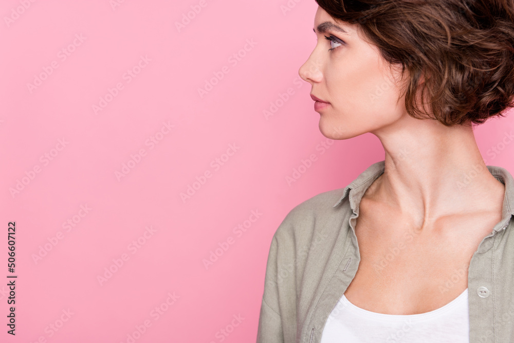 Profile photo of young gorgeous girl look empty space wear grey shirt isolated on pink color background Profile photo of young gorgeous girl look empty space wear grey shirt isolated on pink color background