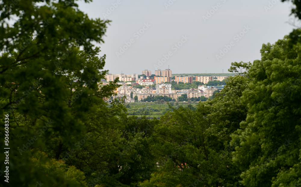 View from above to Pitesti city from Arges County, next to Bucharest, Romania, through a forest.