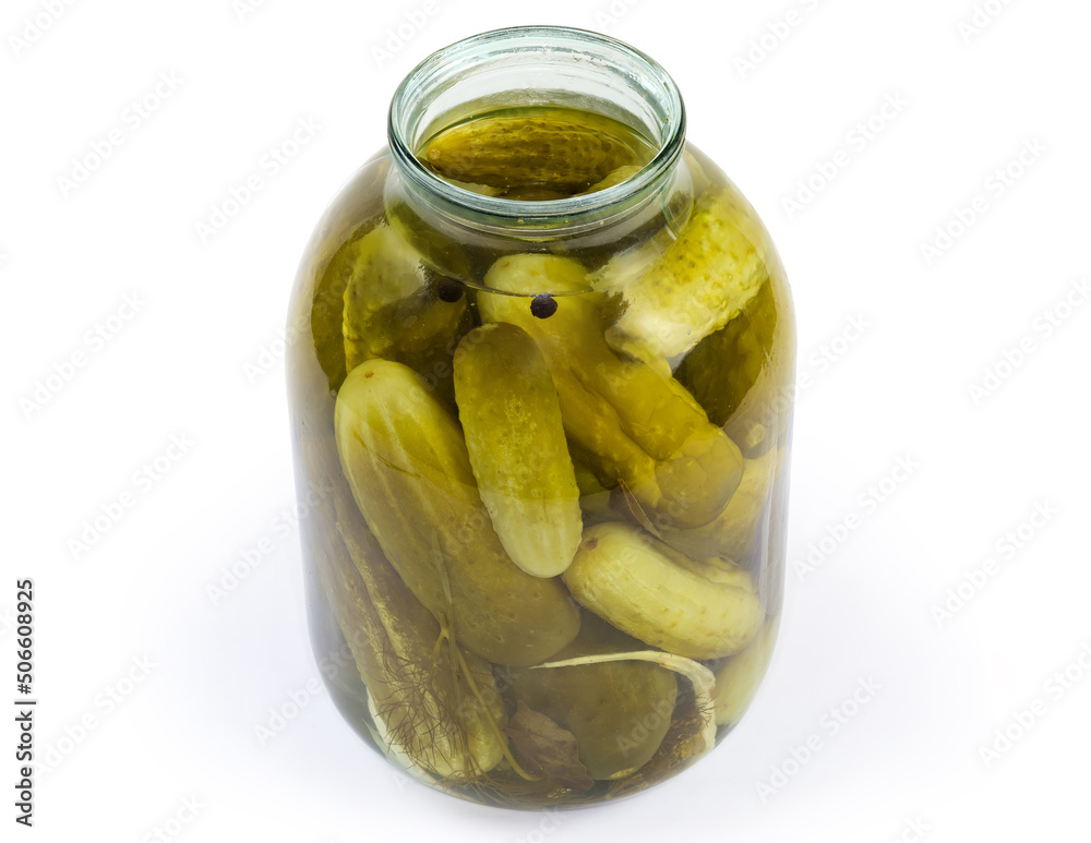 Canned cucumbers in big jar with removed lid Canned cucumbers in big jar with removed lid