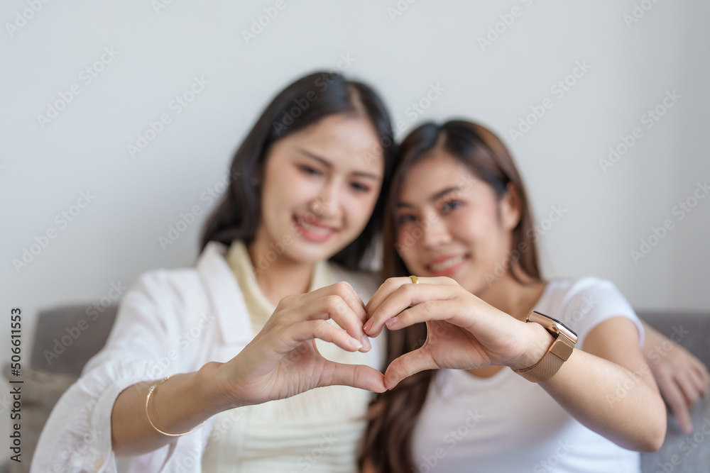 lgbtq, lgbt concept, homosexuality, two Asian women posing happy together and showing love for each other while being together lgbtq, lgbt concept, homosexuality, two Asian women posing happy together and showing love for each other while being together